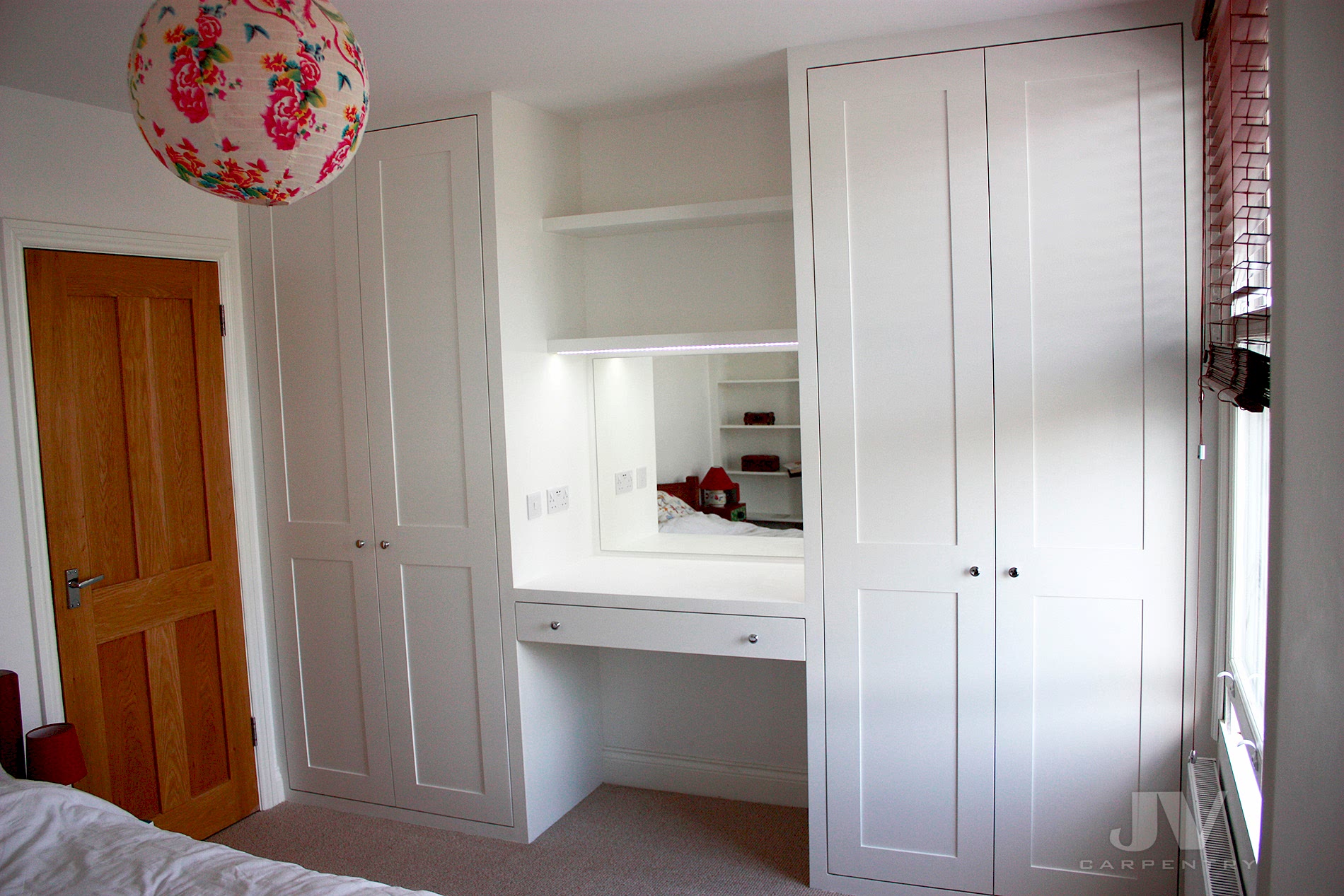 Two fitted wardrobes with dressing table